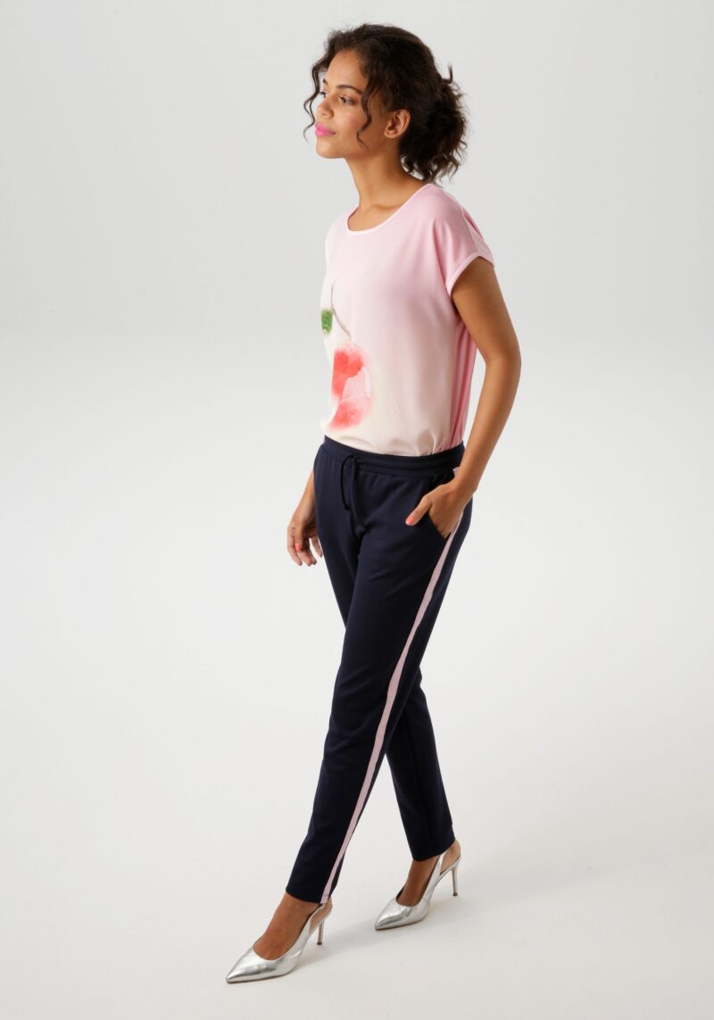 Pull-on trousers with pink tape on the side seams - Image 4