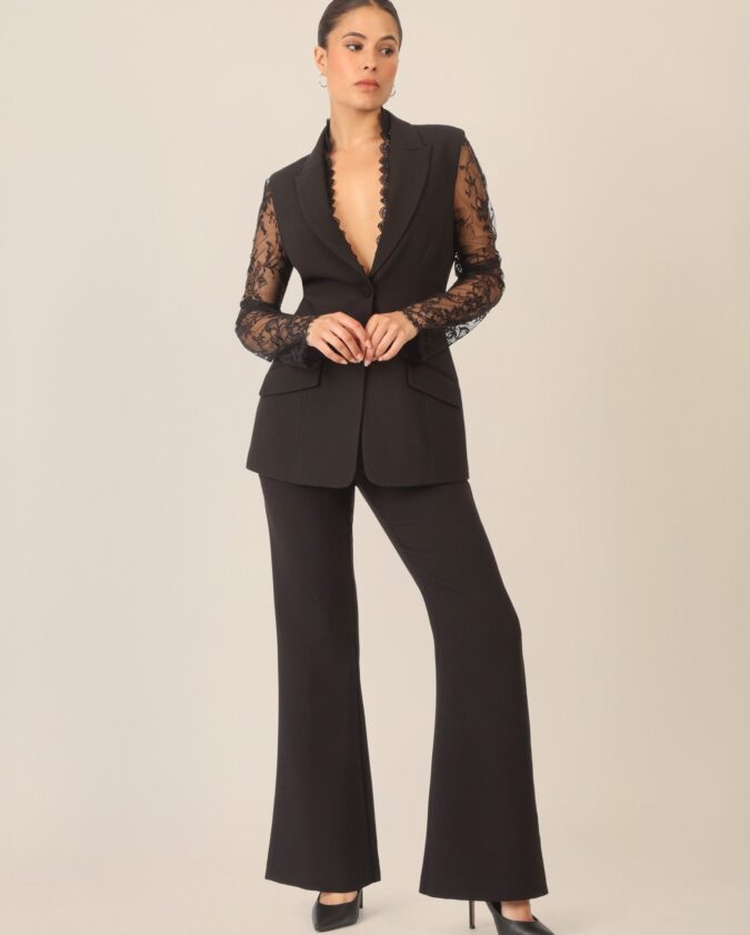 Pantsuit with lace details and decorative edge